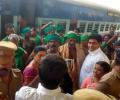 TN farmers return to heroes' welcome in Chennai