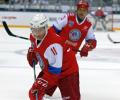 Putin hits the ice for a game of ice hockey