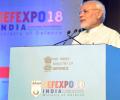 At Defence Expo, PM slams laziness, incompetence, hidden motives