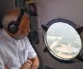 PM surveys flood-hit Kerala, grants Rs. 500 cr emergency aid