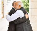 Bear hugs, boat ride as Modi meets Putin for first informal summit