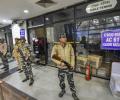 Delhi's D-day: AAP confident, BJP pins hopes on evening votes