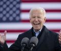 Biden on cusp of making history, Trump has narrow path