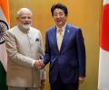 With China in mind, Abe departs with military pact with India