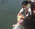 Gen Rawat's daughters immerse ashes of parents in Ganga
