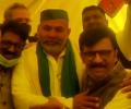 Raut meets farmer leader Tikait at protest site