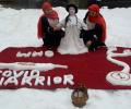 Sisters from Kashmir make snow sculpture as tribute to corona warriors
