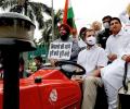 Rahul drives tractor to Parliament to protest against farm laws