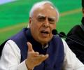 Gandhis should step aside, says Sibal; Cong hits back