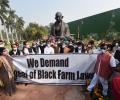 Farm laws repealed in Parliament without debate, Opposition protests