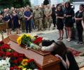 A Mother And Wife Weep For A Life Lost