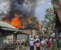 Imphal: Mob clashes with security forces, sets houses on fire