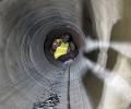 Trapped workers lifted rat-hole miners on their shoulders