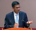 Former CJI Chandrachud denies reports of...