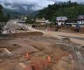 'Saw people being swept away by the mud'