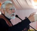 Modi says BJP won't discontinue Delhi govt's welfare schemes