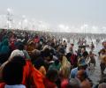 1.5 cr take holy dip daring intense cold as Maha Kumbh begins