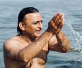 Akhilesh Yadav takes holy dip at Maha Kumbh, says prayed for harmony