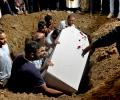 Burials, Mourners, Search For Victims