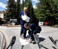 Why Is Britain's PM At Trump's Feet?