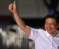 Singapore's ruling party sweeps back to power
