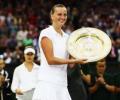 Kvitova hands Bouchard royal thumping to win Wimbledon