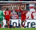 Bayern survive Evra stunner to knock out Man Utd