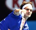 Federer downs Rochus to advance at Swiss Indoors