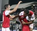 Arsenal scrape past Udinese to book CLeague spot