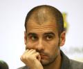 Guardiola to extend Barca contract to June 2012