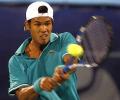 Federer eases past Somdev in Dubai