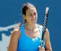 Top seed Bartoli retires injured in Bali