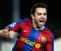 Champions League: Xavi tips the scales for Barca, Arsenal through