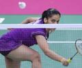 Saina demolishes Jie Yao to enter quarter-finals