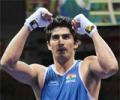 Vijender scores narrow win to enter quarter-finals