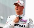 Schumacher plays down title chances