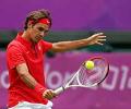 Federer survives first round scare