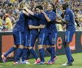 France storm past Ukraine in rain-affected match