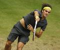 Federer strolls past Youzhny, meets Haas in final