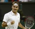 Federer survives five-set thriller to reach last 16