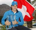 Cool Federer downs Isner to win Indian Wells title
