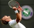 Nadal stunned by 135th-ranked Darcis in first round at Wimbledon