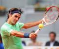 Mint-green Federer looking sharp on competitive return