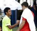 Somdev advances in Dubai after Del Potro retires hurt