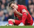 Injured Agger sidelined for up to a month