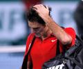 Federer's number one hopes take a hit in Paris defeat