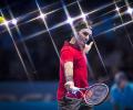 ATP Tour Finals PHOTOS: Federer made to grind it out by Raonic
