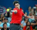 Rusty Federer scrapes through to win season debut