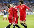Fellaini nets double as Belgium humble France