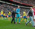 How Sweet! Ajax players get walked onto pitch by their mothers!